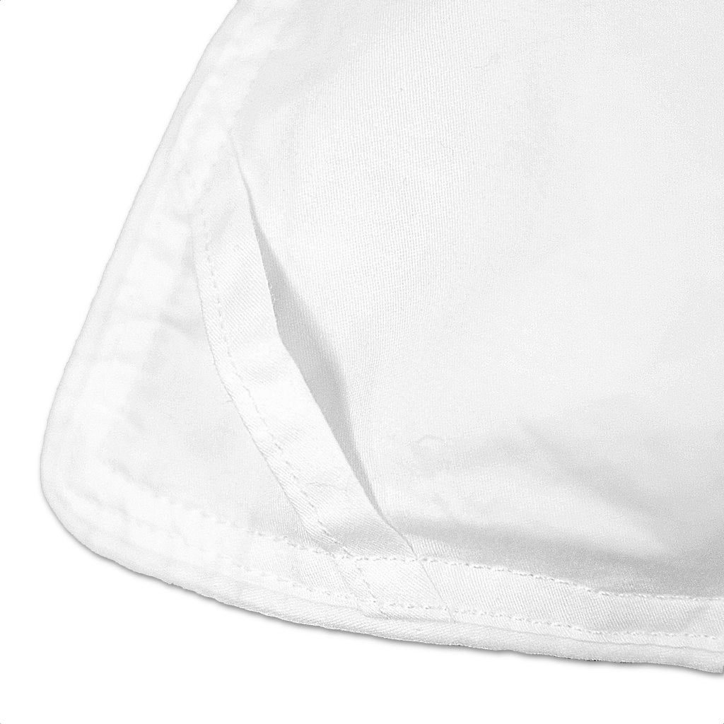 Close up view of the corners of the Acadia Down Duvet with tie-down system corner loops that keep the duvet securely in place