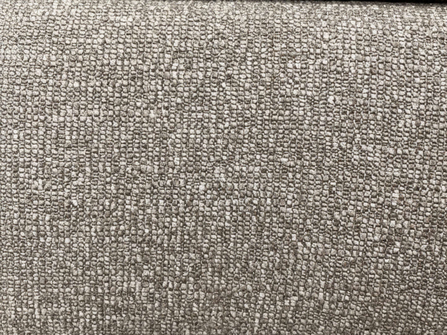 Close-up of a textured gray fabric surface