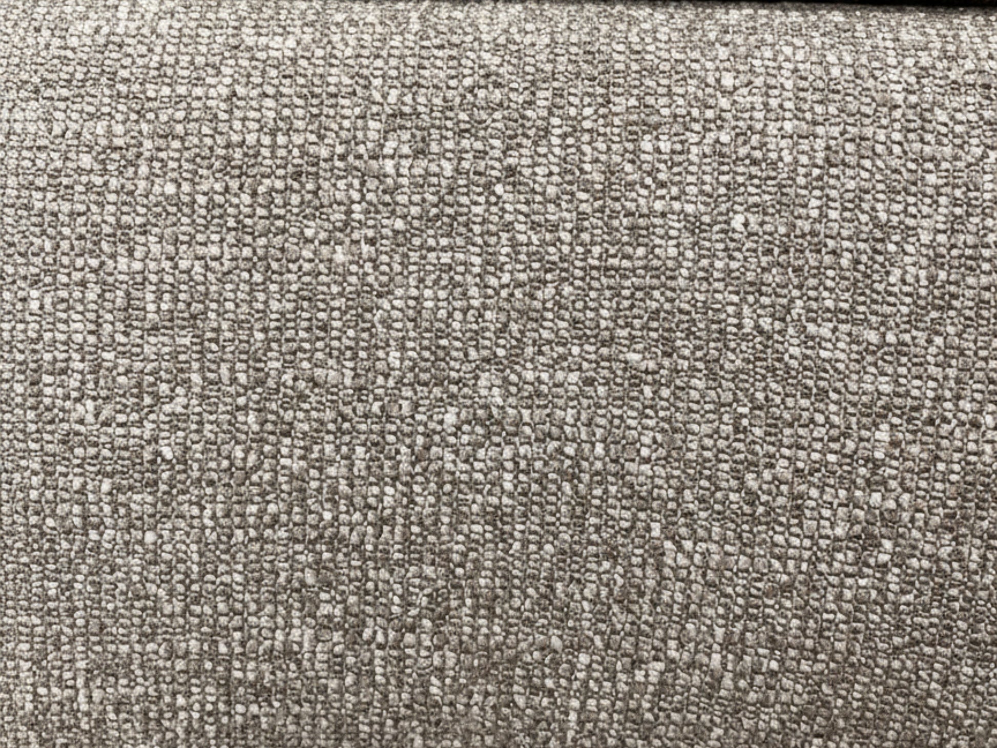 Close-up of a textured gray fabric surface